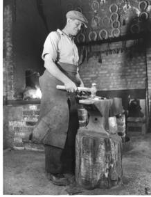 Arthur Reeve in his forge
