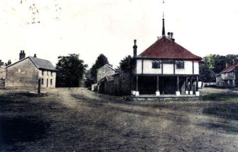 Views of Market Cross.  Note pump on Market Place